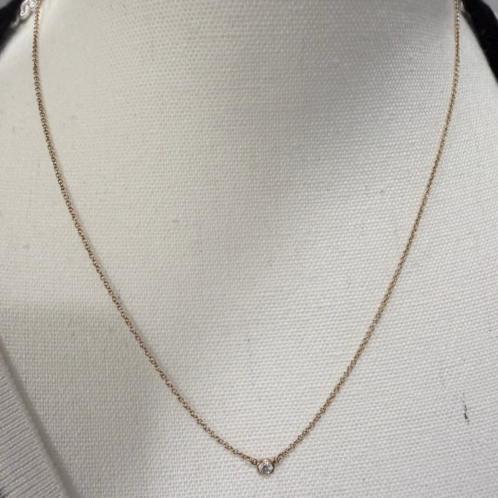 Elsa Peretti Tiffany & Co Single Diamond pendant in 18k gold